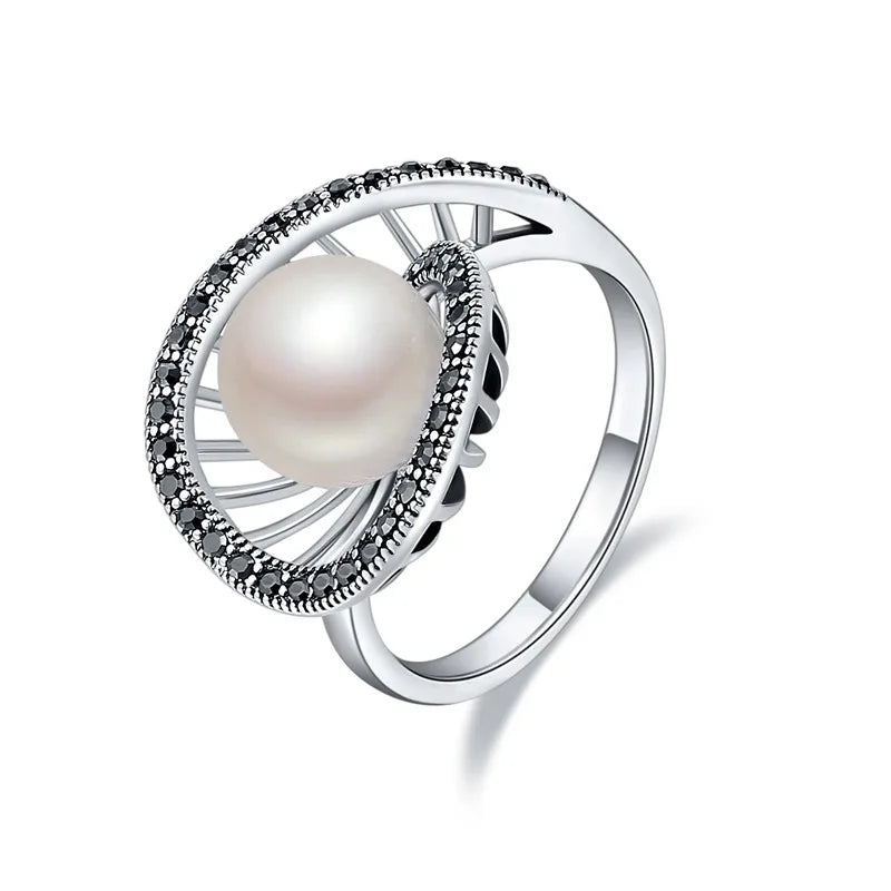 Anel geométrico vazado com pérola branca