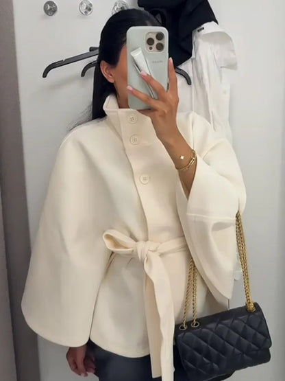 Casaco poncho estilo vintage com gola alta