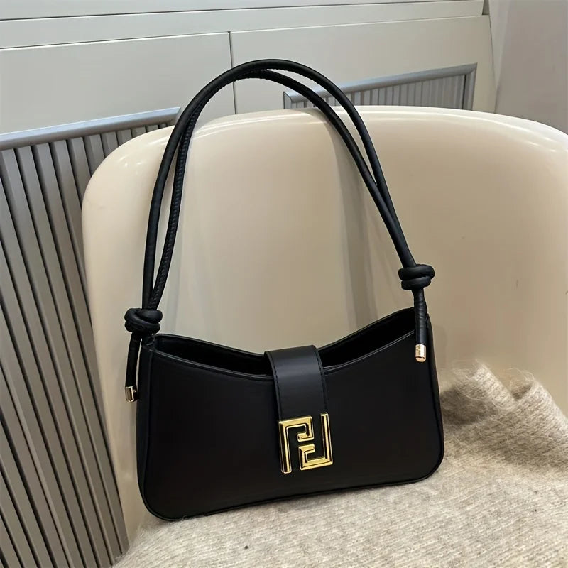 Bolsa de ombro com alça ajustável e fecho de fivela