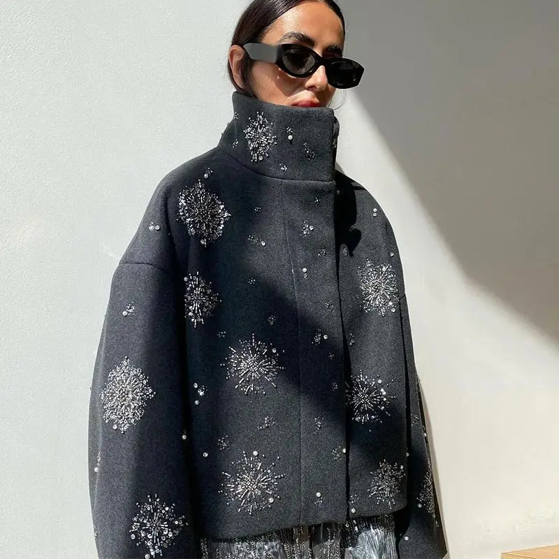 Casaco com bordados e missangas