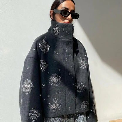 Casaco com bordados e missangas